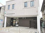 日野駅前郵便局 506m