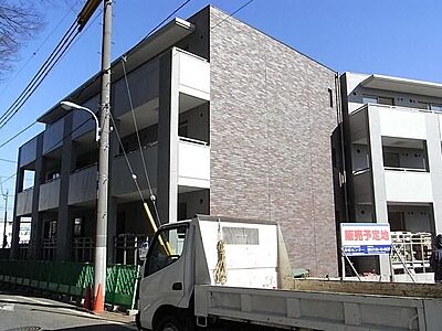 外観：外観タイル貼りのマンション