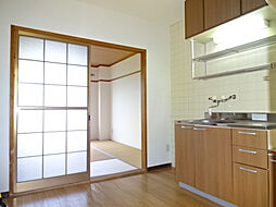 メゾンボヌール 202 2階3Kのリビング/ダイニング