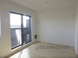 ラクーン守山 3階1LDKのリビング/ダイニング