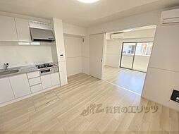 JR片町線(学研都市線) 津田駅 徒歩13分の賃貸アパート 1階1LDKのリビング/ダイニング