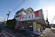 ドラッグストアセキ堀の内町店 徒歩20分。 1590m