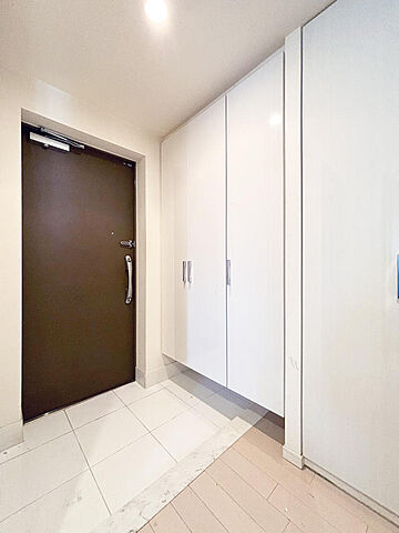 玄関 プレジール立石 4階/-