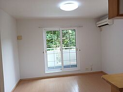 JR鹿児島本線 上伊集院駅 徒歩13分の賃貸アパート 2階1LDKのリビング/ダイニング