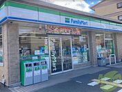 ファミリーマート川西でざいけ店 349m