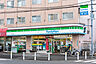 周辺：ファミリーマート 多摩連光寺店　徒歩5分