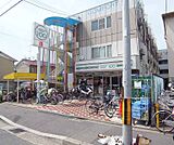 ローソンストア100　深草西浦町店まで54m