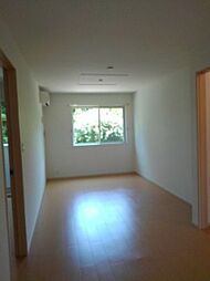 リバーサイドハピネス 1階1LDKのリビング/ダイニング