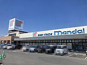 万代河南町店 徒歩22分。 1690m
