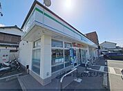 ファミリーマート　橿原小綱町店まで450メートル