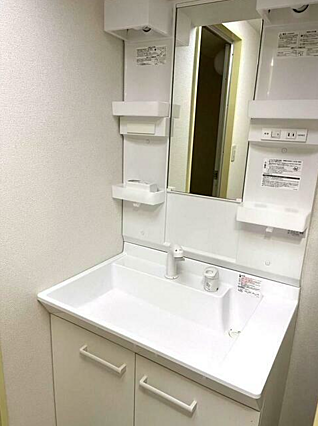 洗面台新規交換...