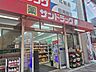 周辺：サンドラッグ明石駅前店 100m