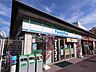 周辺：ファミリーマート 近鉄東生駒駅前店（210m）