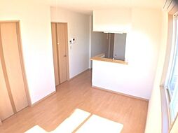 アラモード ガーデン 2階1LDKのリビング/ダイニング