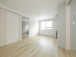 ＵＲＢＡＮ　ＦＬＡＴＳ　中の島 1階2LDKのリビング/ダイニング