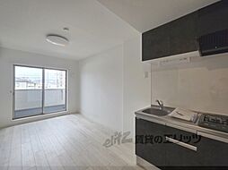 アッサンブレ 101 1階1LDKのリビング/ダイニング