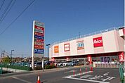 セブンタウン 徒歩5分。ショッピングセンター 330m