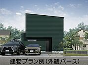 シンプルな箱型フォルムに、濃いグリーンの外観が際立つ2階建ての住まい