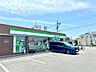 周辺：ファミリーマート 味美町店（439m）