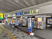 アルカドラッグ阪急曽根店 345m