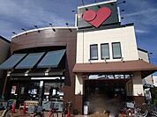 マルヤス 登美の里店 徒歩9分。 670m