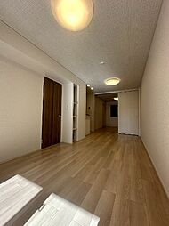 サクラ・コート阿成 1階1LDKのリビング/ダイニング