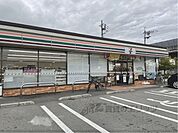 セブンイレブン　葛城西室店まで1600メートル