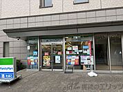 ファミリーマートラグザ大阪店 徒歩11分。 860m