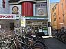 周辺：ファミリーマート阪急西院駅前店 880m