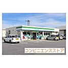 コンビニ「ファミリーマート米子卸団地店まで400ｍ」ファミリーマート米子卸団地店