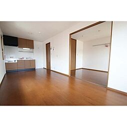 ファミーユつくばABC 1階3LDKのリビング/ダイニング