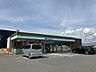 周辺：ファミリーマート伊予上野店 1105m