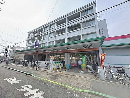 コープみらい西調布店 855m