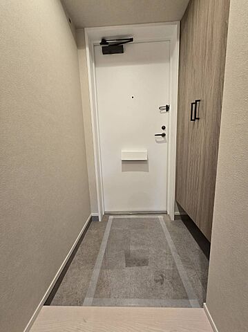 玄関 アルシェ西新井 1階/-