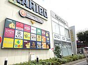 ショッピングタウン・カリブ梅島店まで872ｍ