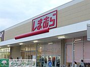 ファッションセンターしまむらホームズ仙川店 徒歩12分。ショッピングセンター 890m
