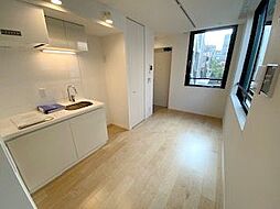 CARITAS用賀 106 1階ワンルームのリビング/ダイニング