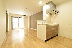 近鉄橿原線 橿原神宮前駅 徒歩5分の賃貸マンション 1階1LDKのリビング/ダイニング