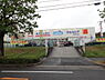 周辺：ウエルシア富田林津々山台店まで1003m