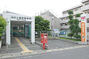 向日上植野郵便局まで86m