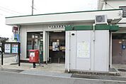 向日森本郵便局まで619m