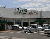 まるごうみのかや店まで878m、営業時間　9時～22時