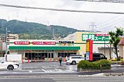業務スーパーTAKENOKO上牧店まで818m