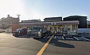 セブン-イレブン明石土山北店まで878m