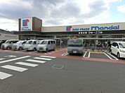 万代南津の辺店まで980m
