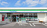周辺：ファミリーマート箕面牧落三丁目店まで563m