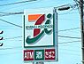 周辺：セブンイレブン新潟松崎店まで721m