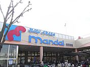 万代新石切店まで934m