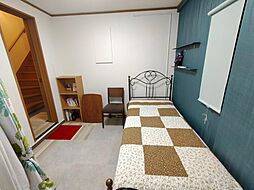 Cocoro白山ハウス 101 1階ワンルームの寝室