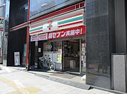 コンビニエンスストアセブン−イレブン 神田小川町2丁目店まで107ｍ